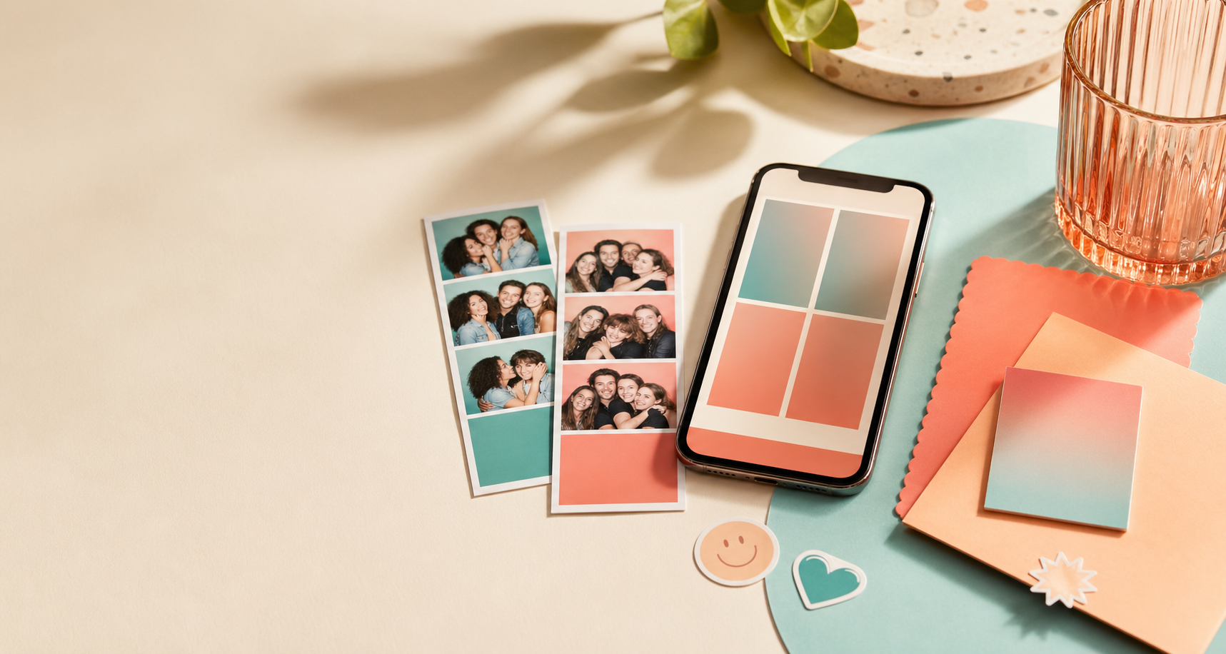 A styled DigiBooth scene with photobooth prints, a smartphone mockup, and pastel stationery.